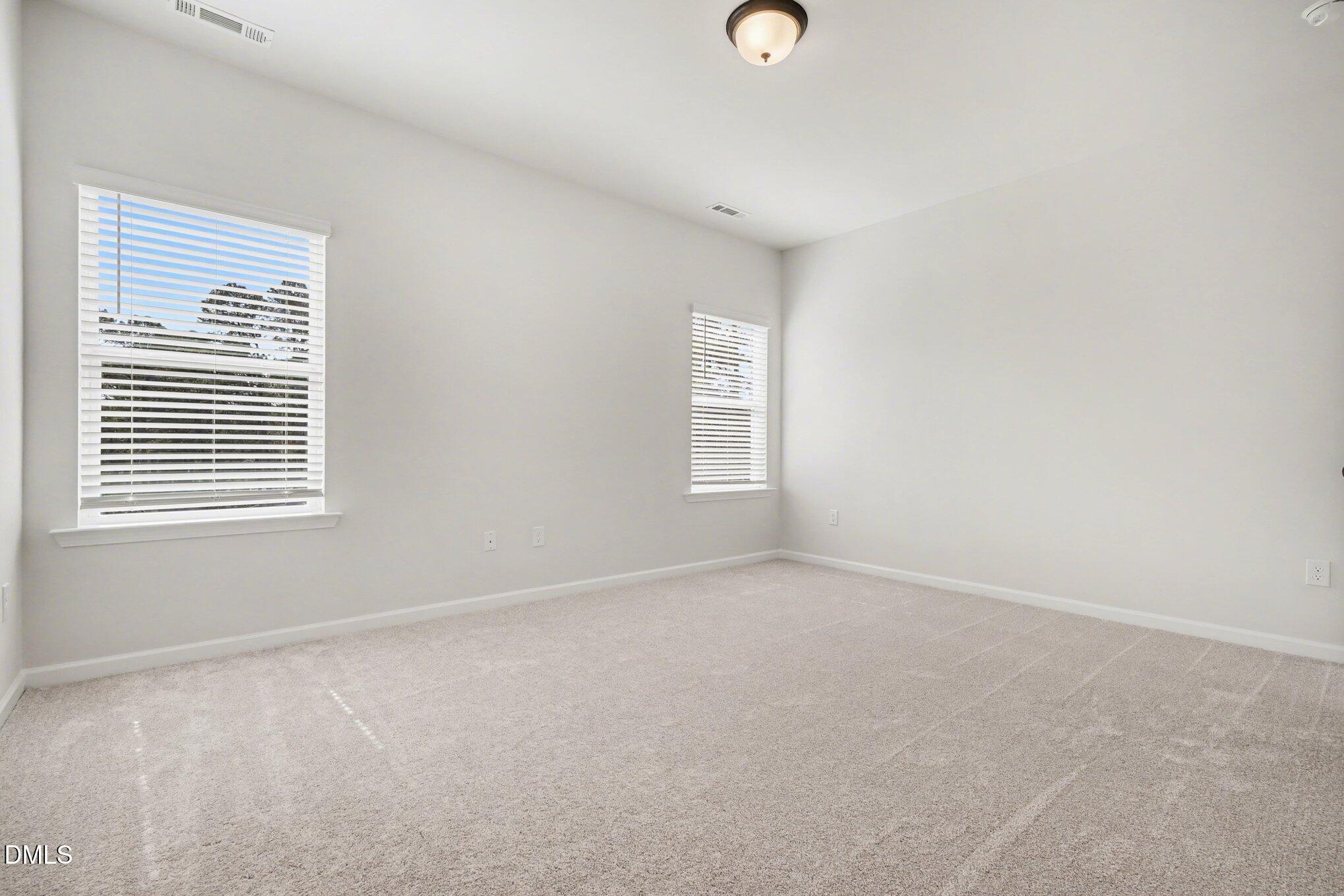 720 Orch Vista Circle Raleigh, NC 27606 - Photo 10 of 28 an empty room with a window