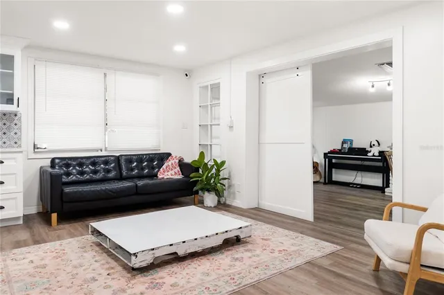 a living room with furniture and a couch