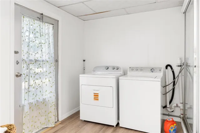 a utility room with dryer and washer