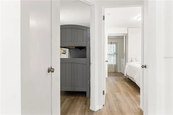 a view of a bathroom from a hallway