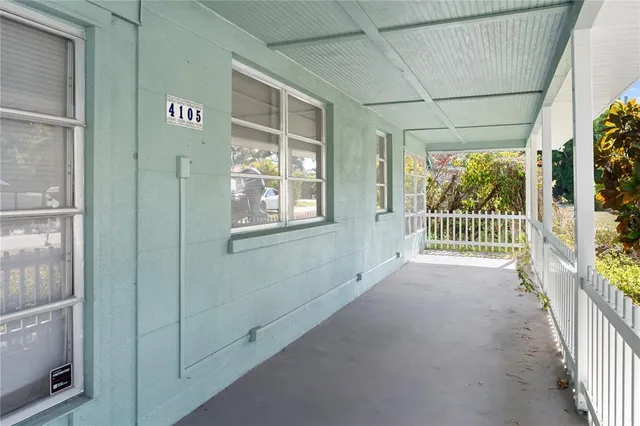 a view of porch and garden