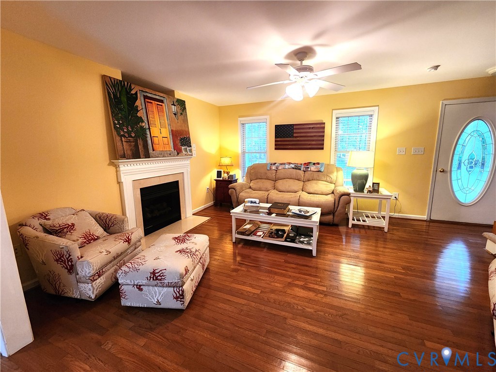 2744 Smokey Road Aylett, VA 23009 - Photo 6 of 72 Wood-finish flooring throughout, white mantel fire