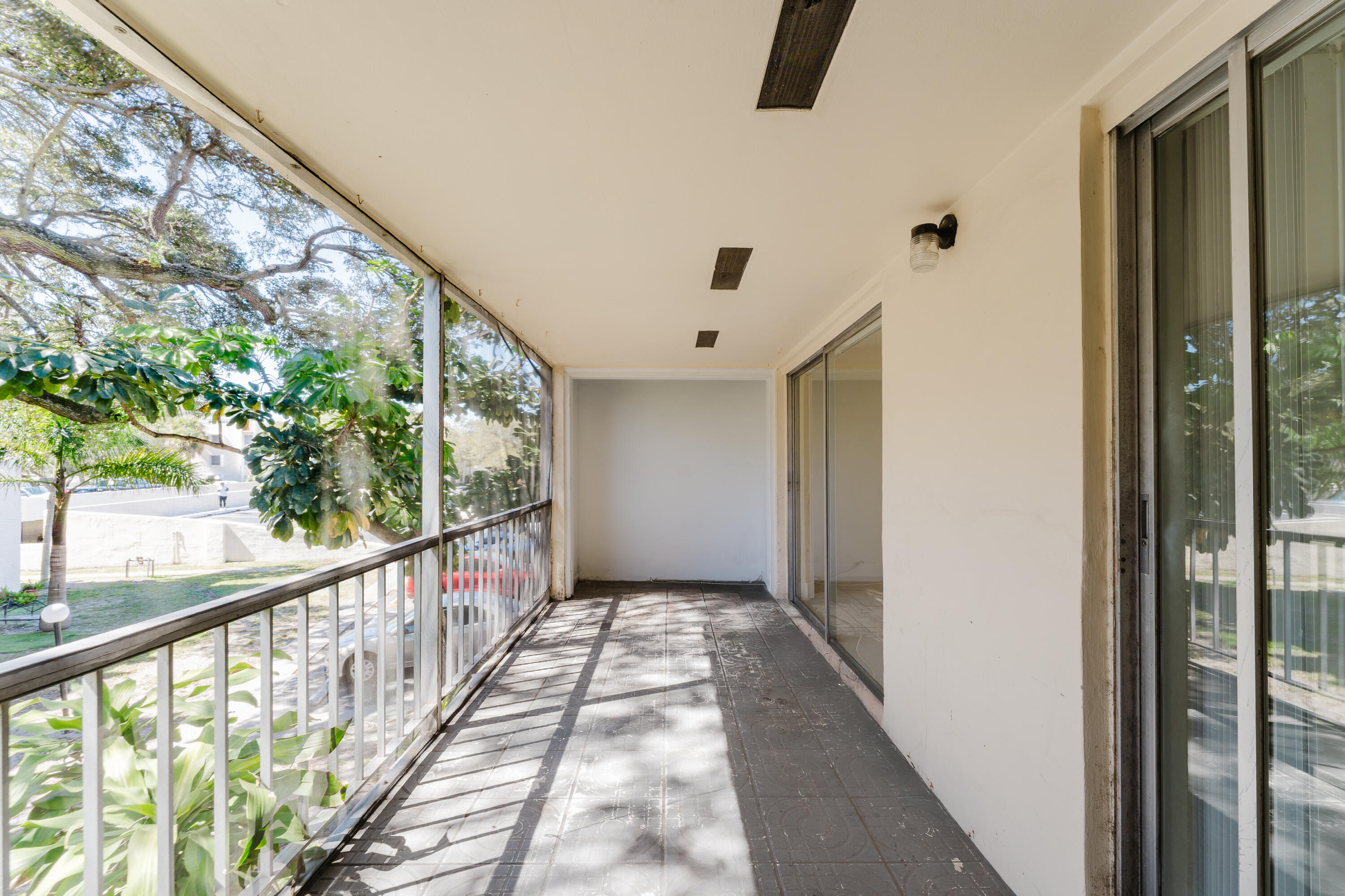 606 Northwest 13th Street, Unit 23 Boca Raton, FL 33486 - Photo 31 of 37 a view of hallway with stairs