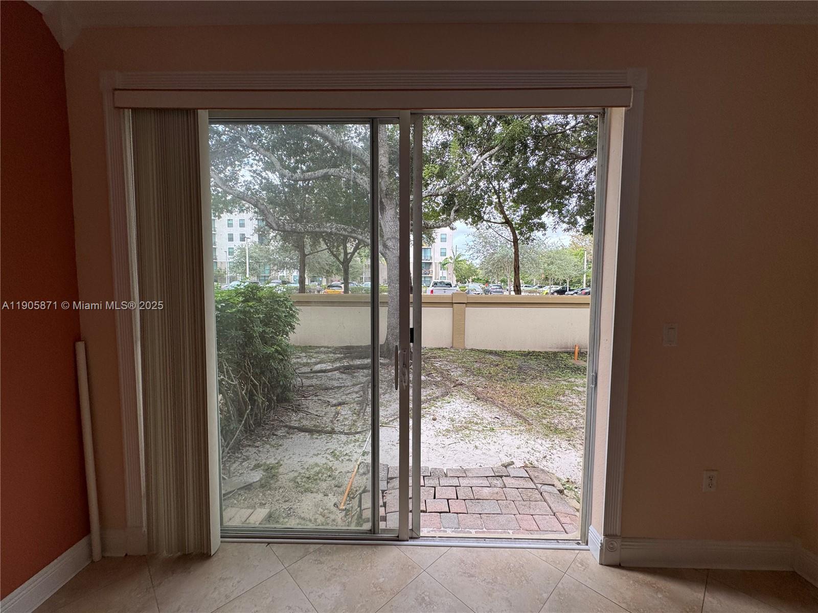3166 Merrick Terrace, Unit 1705 Margate, FL 33063 - Photo 14 of 41 a view of a room with a large window