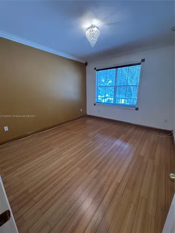 a bathroom with a sink mirror and a bath tub