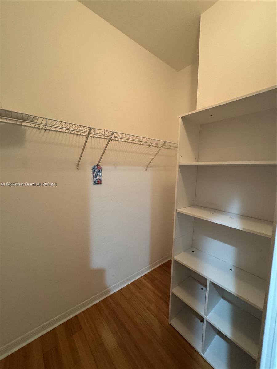 3166 Merrick Terrace, Unit 1705 Margate, FL 33063 - Photo 33 of 41 a view of an empty walk in closet