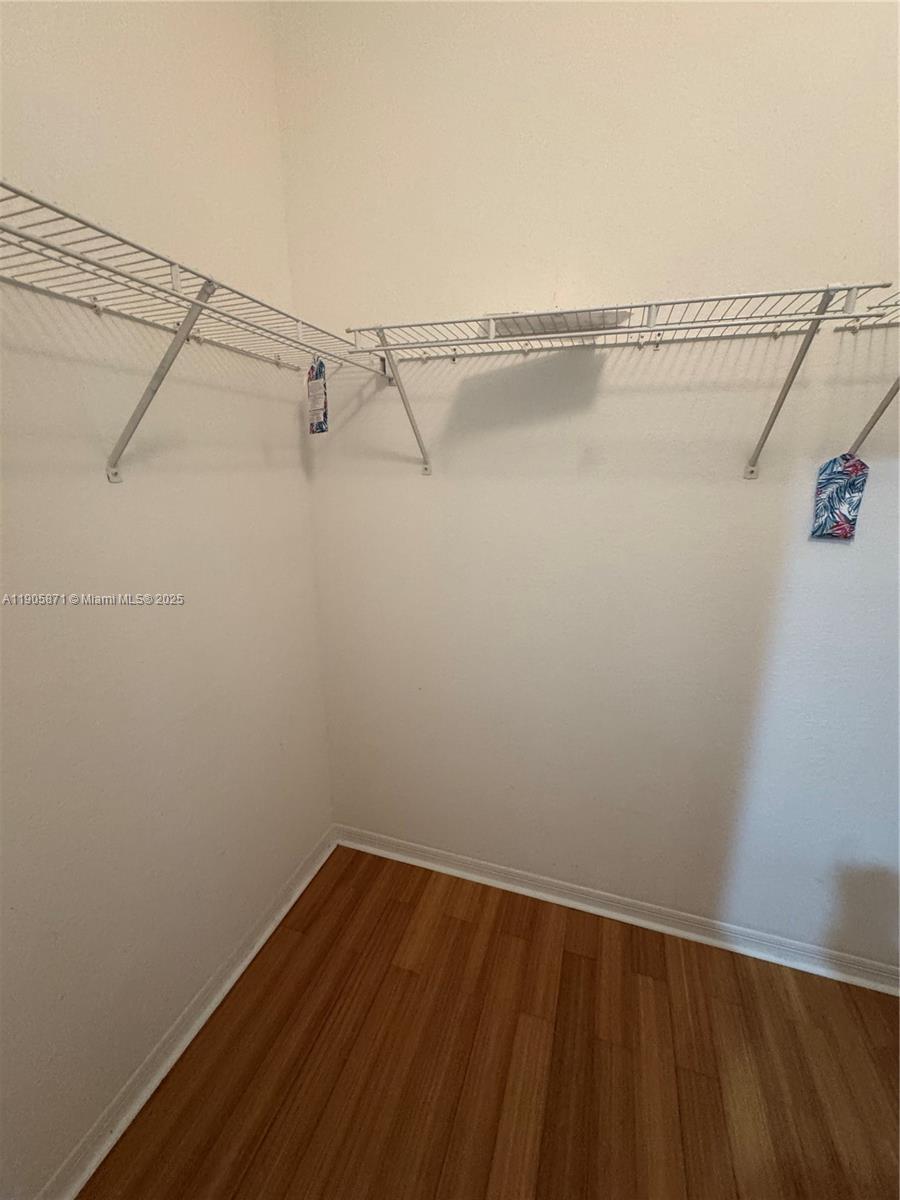 3166 Merrick Terrace, Unit 1705 Margate, FL 33063 - Photo 34 of 41 a view of a room with racks on the wall