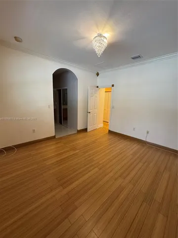 a sign that is on a brick wall