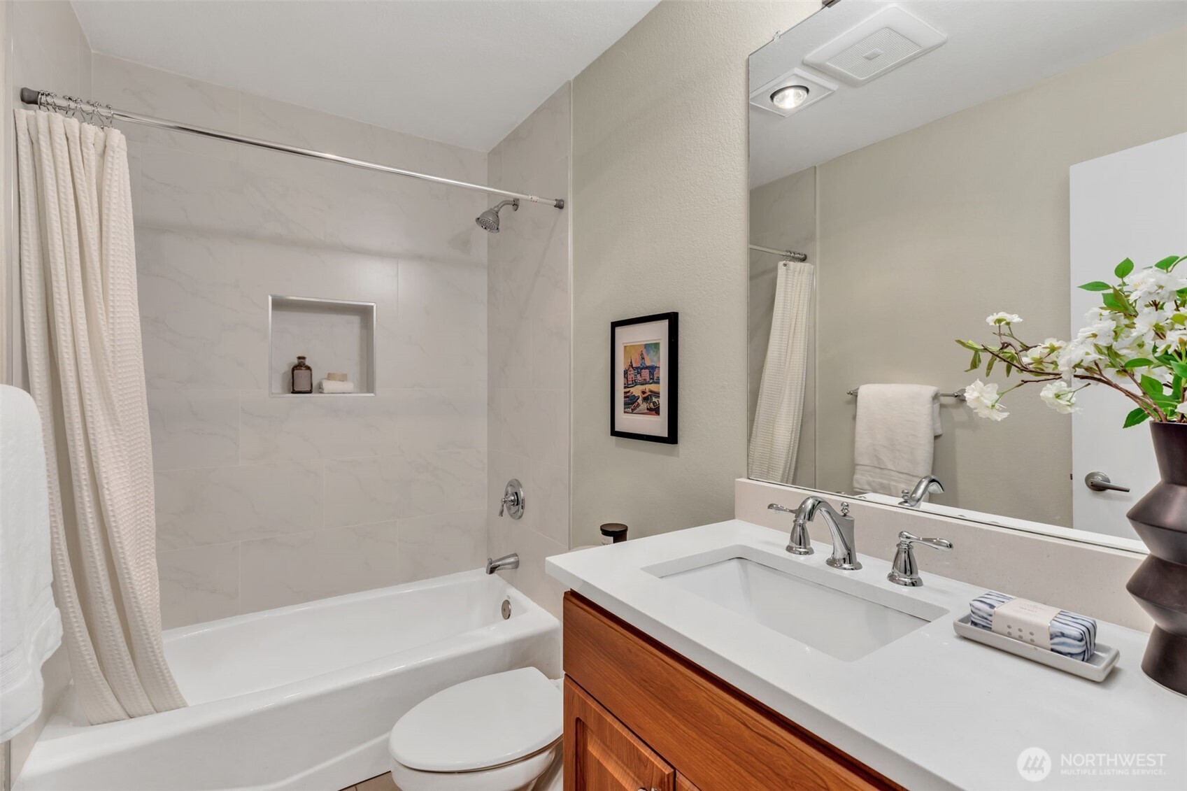 9009 Avondale Road Northeast, Unit D107 Redmond, WA 98052 - Photo 24 of 34 a bathroom with a granite countertop sink toilet and shower