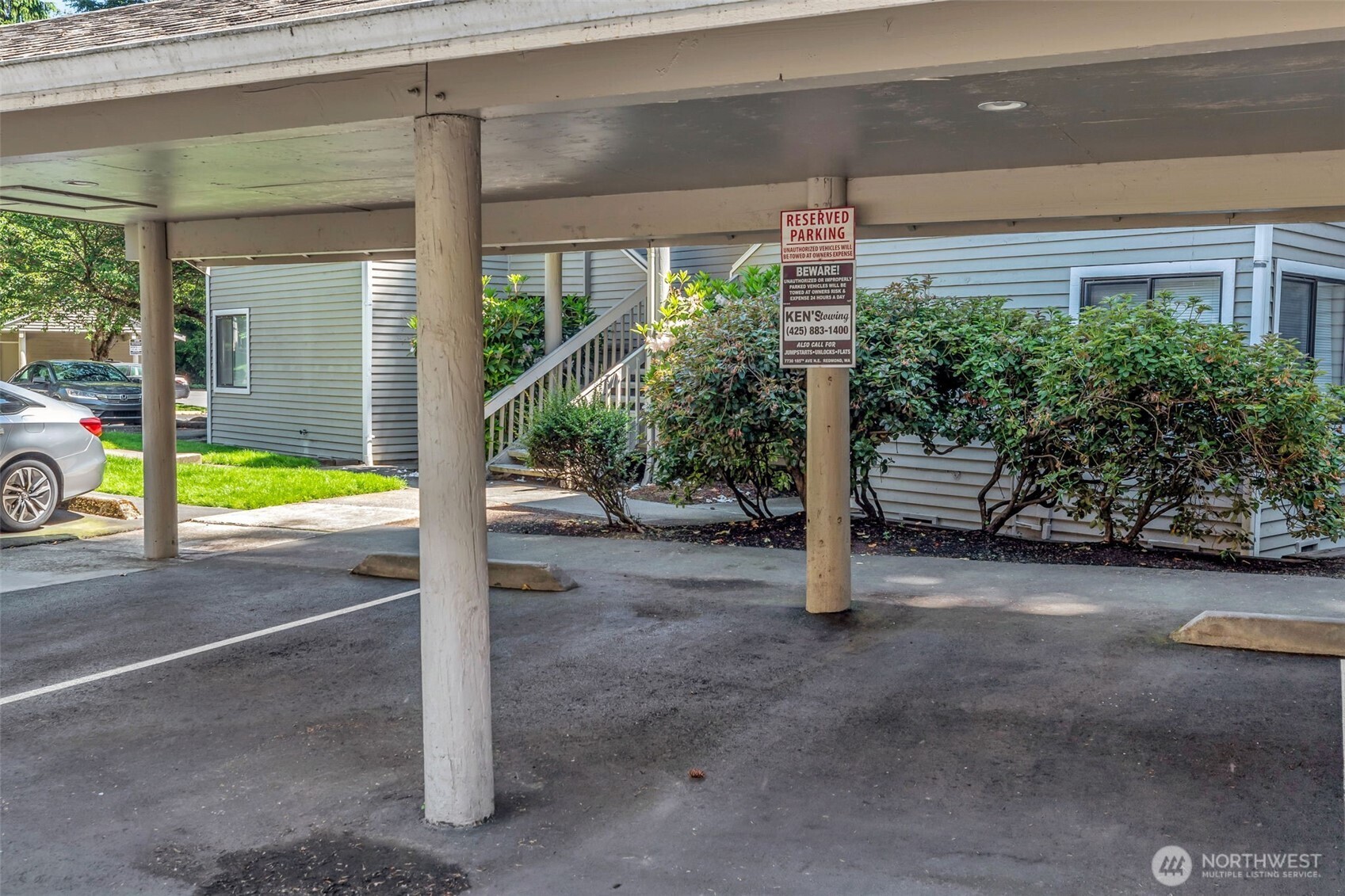 9009 Avondale Road Northeast, Unit D107 Redmond, WA 98052 - Photo 27 of 34 a view of a house with a street
