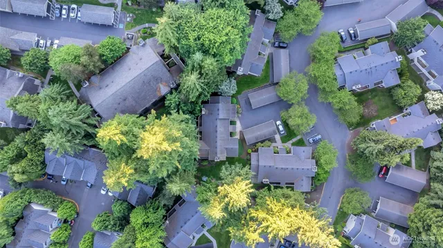 an aerial view of a house with a garden