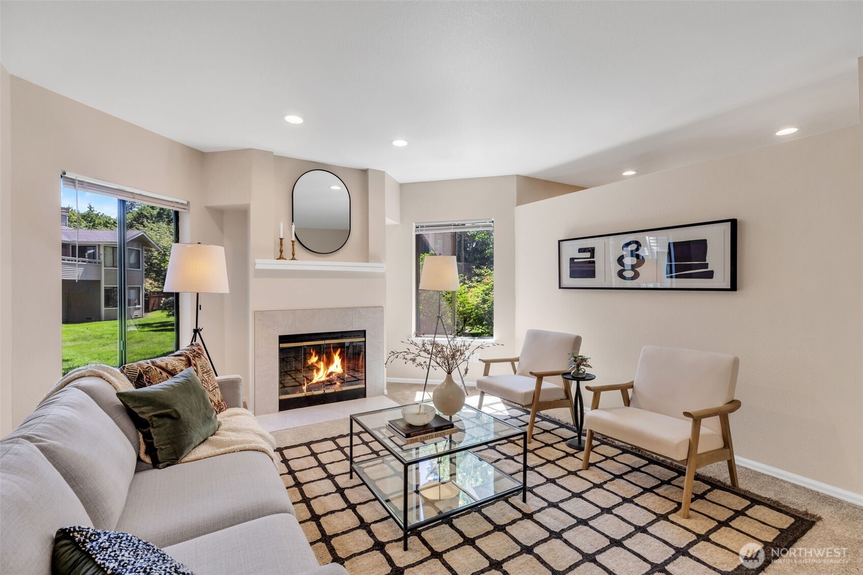 9009 Avondale Road Northeast, Unit D107 Redmond, WA 98052 - Photo 5 of 34 a living room with furniture and a fireplace