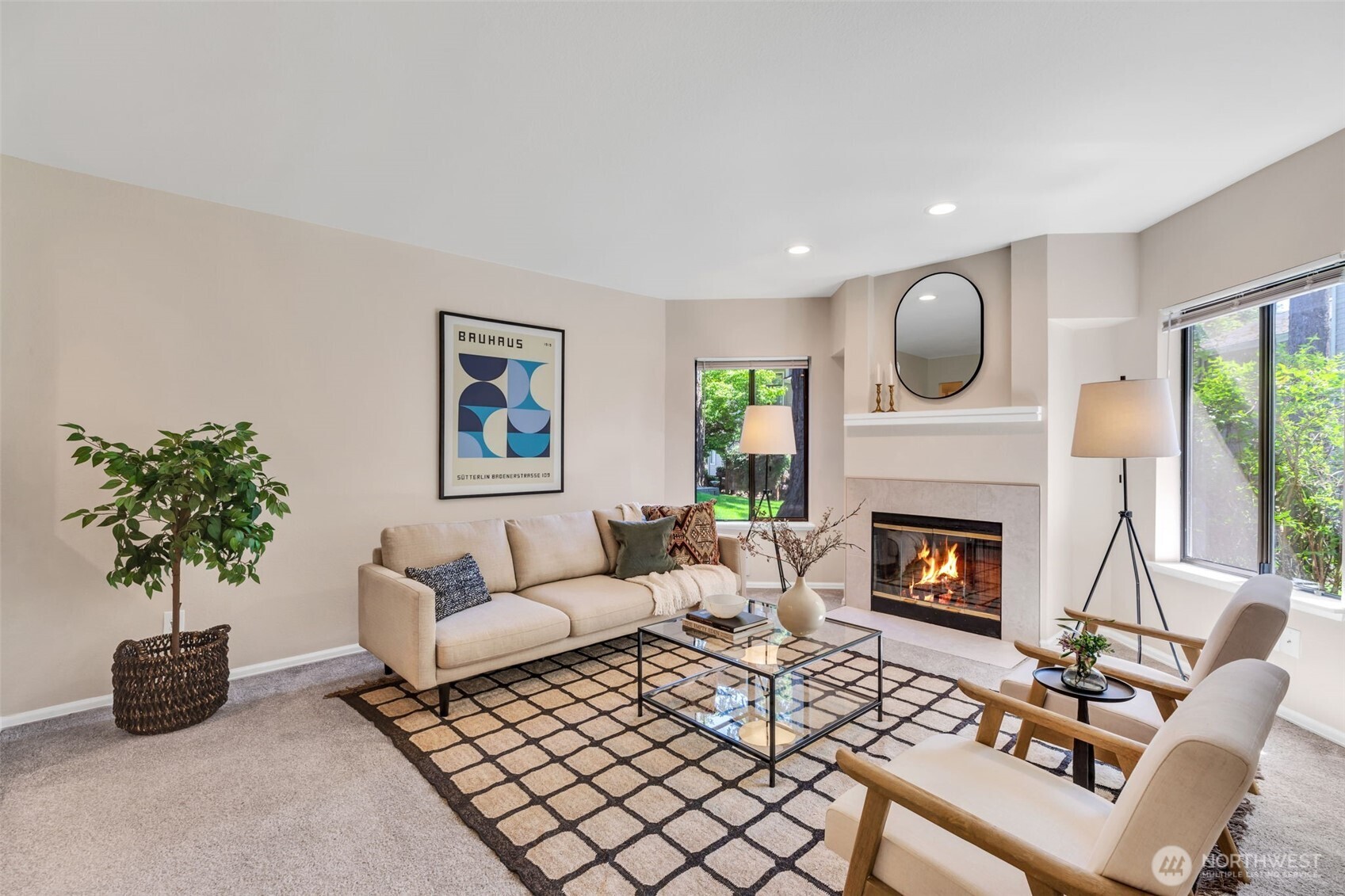 9009 Avondale Road Northeast, Unit D107 Redmond, WA 98052 - Photo 6 of 34 a living room with furniture and a potted plant