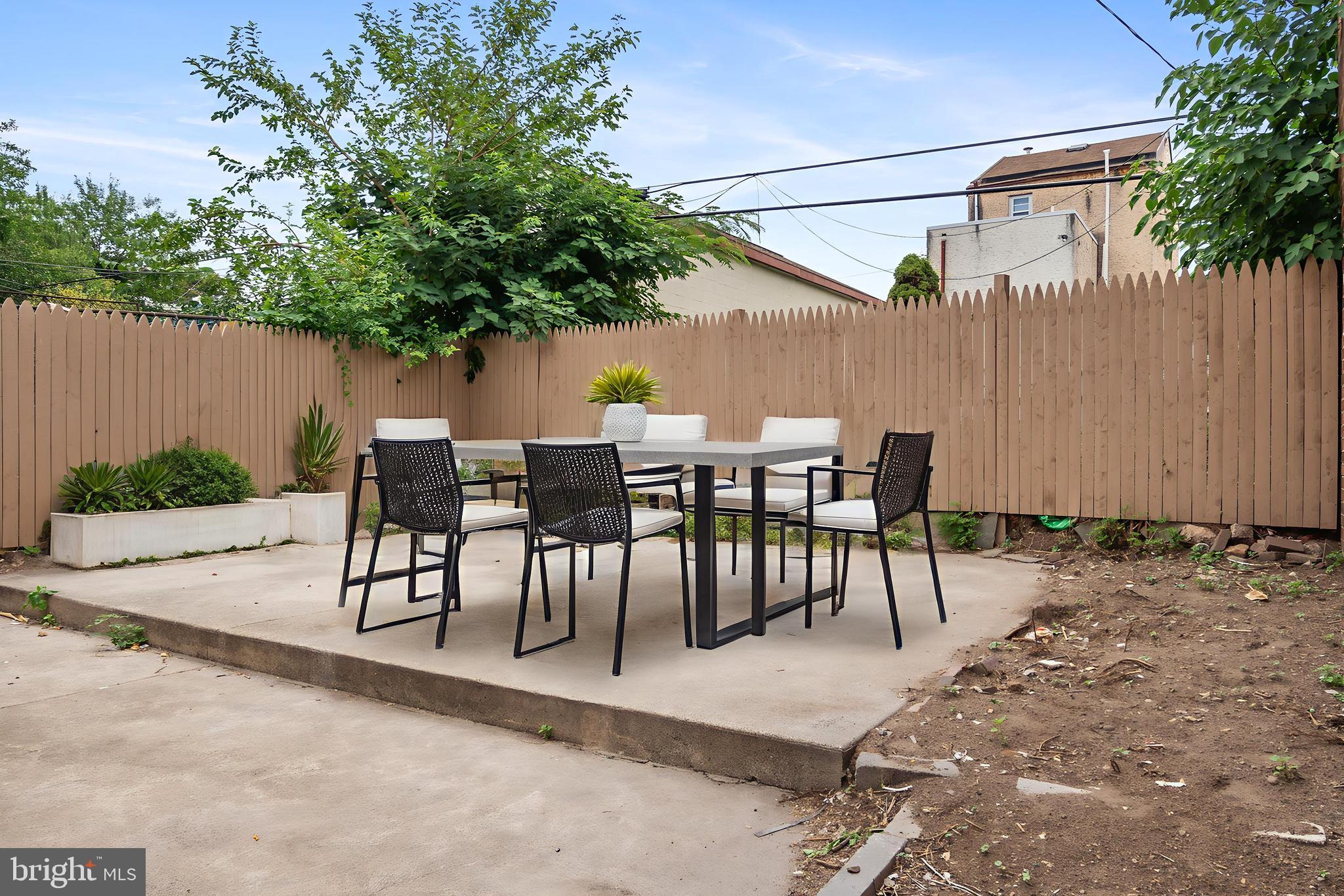 2652 Bridge Street Philadelphia, PA 19137 - Photo 20 of 31 a view of a dinning table and chairs in patio