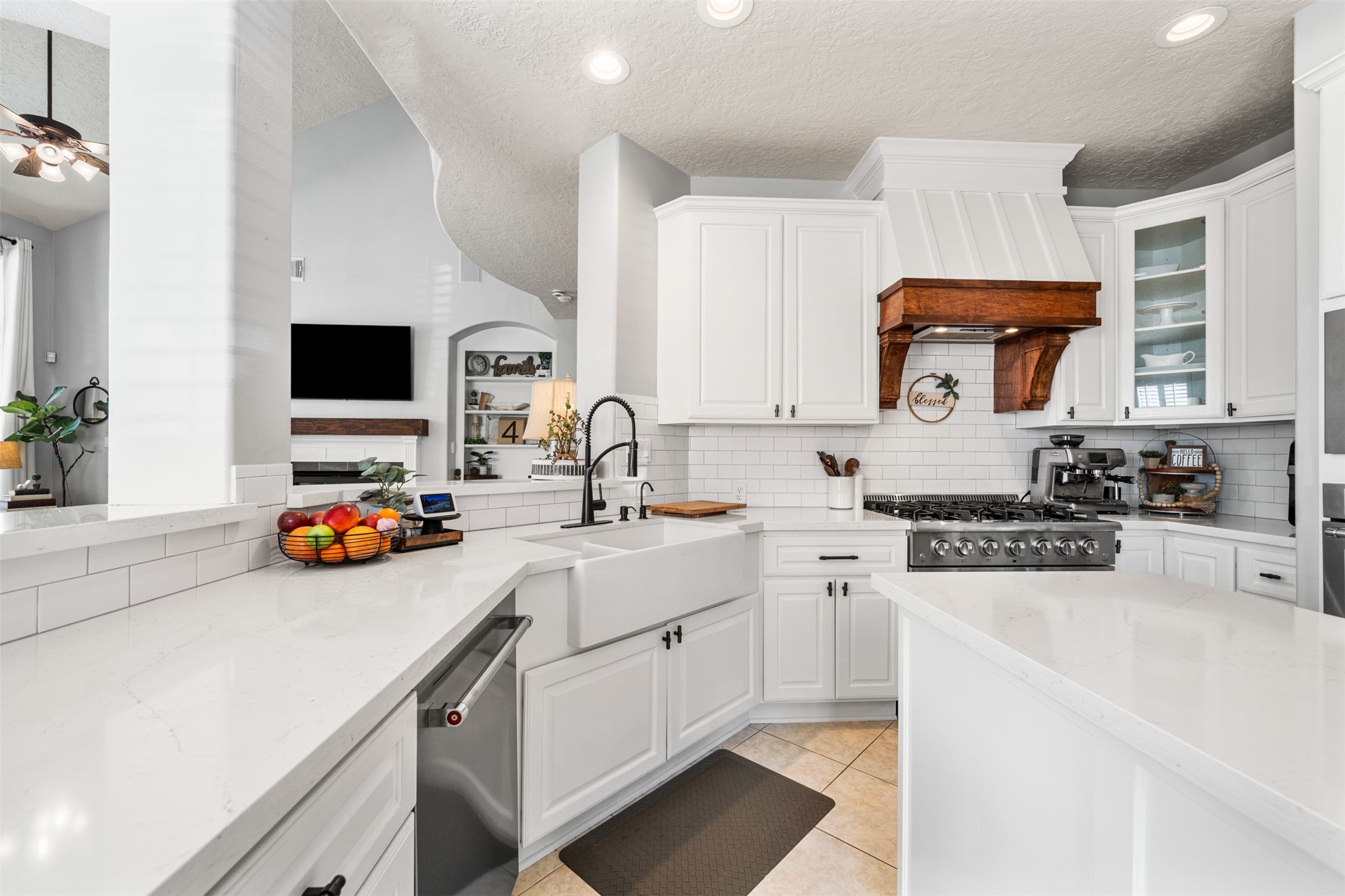 28446 Shining Creek Lane Spring, TX 77386 - Photo 18 of 47 a kitchen with lots of counter top space stove and cabinets