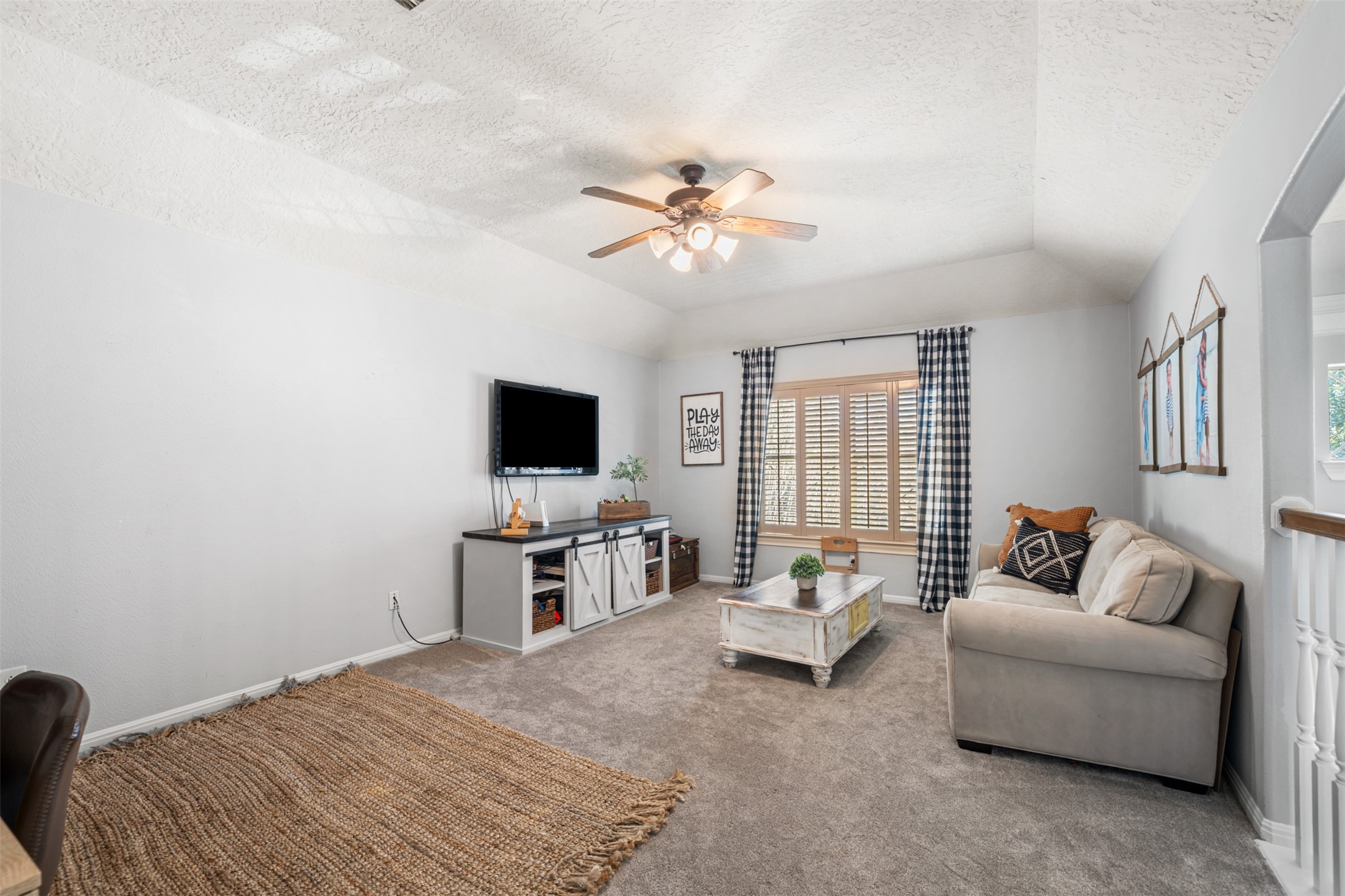 28446 Shining Creek Lane Spring, TX 77386 - Photo 30 of 47 a bedroom with furniture and a flat screen tv