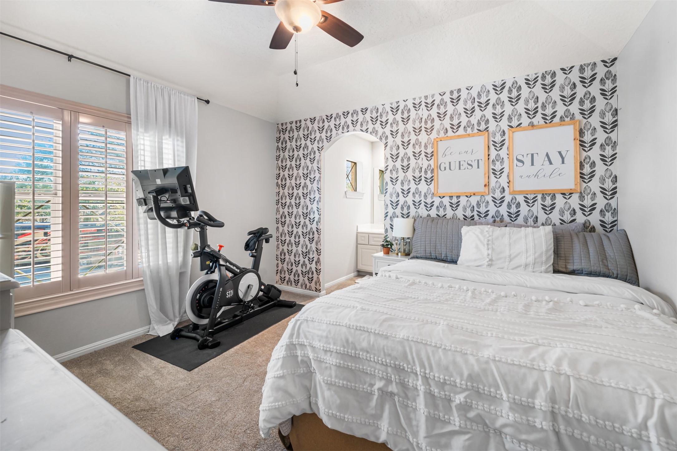 28446 Shining Creek Lane Spring, TX 77386 - Photo 35 of 47 a bedroom with a bed and a large window