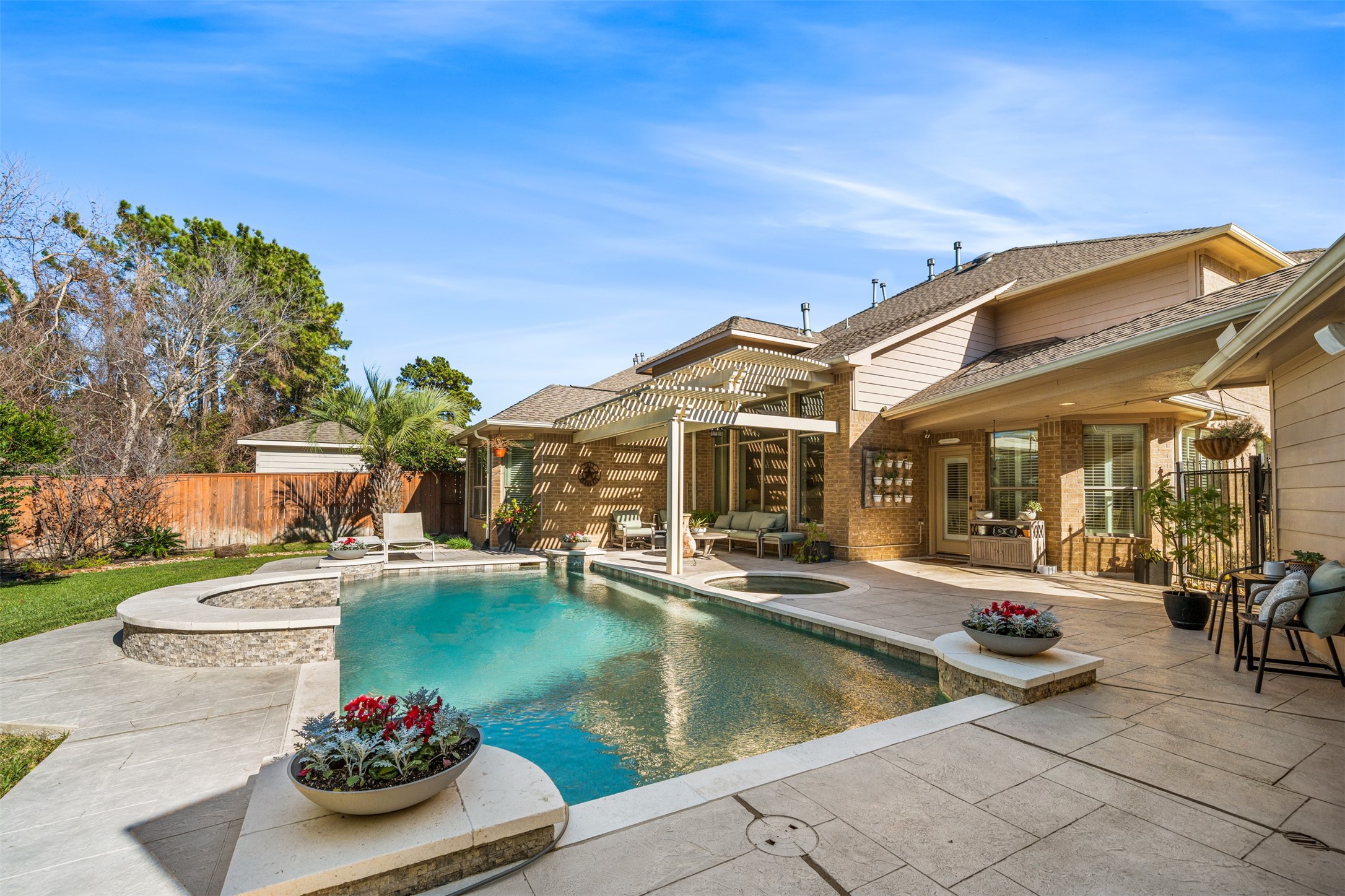 28446 Shining Creek Lane Spring, TX 77386 - Photo 39 of 47 a view of a house with swimming pool and furniture