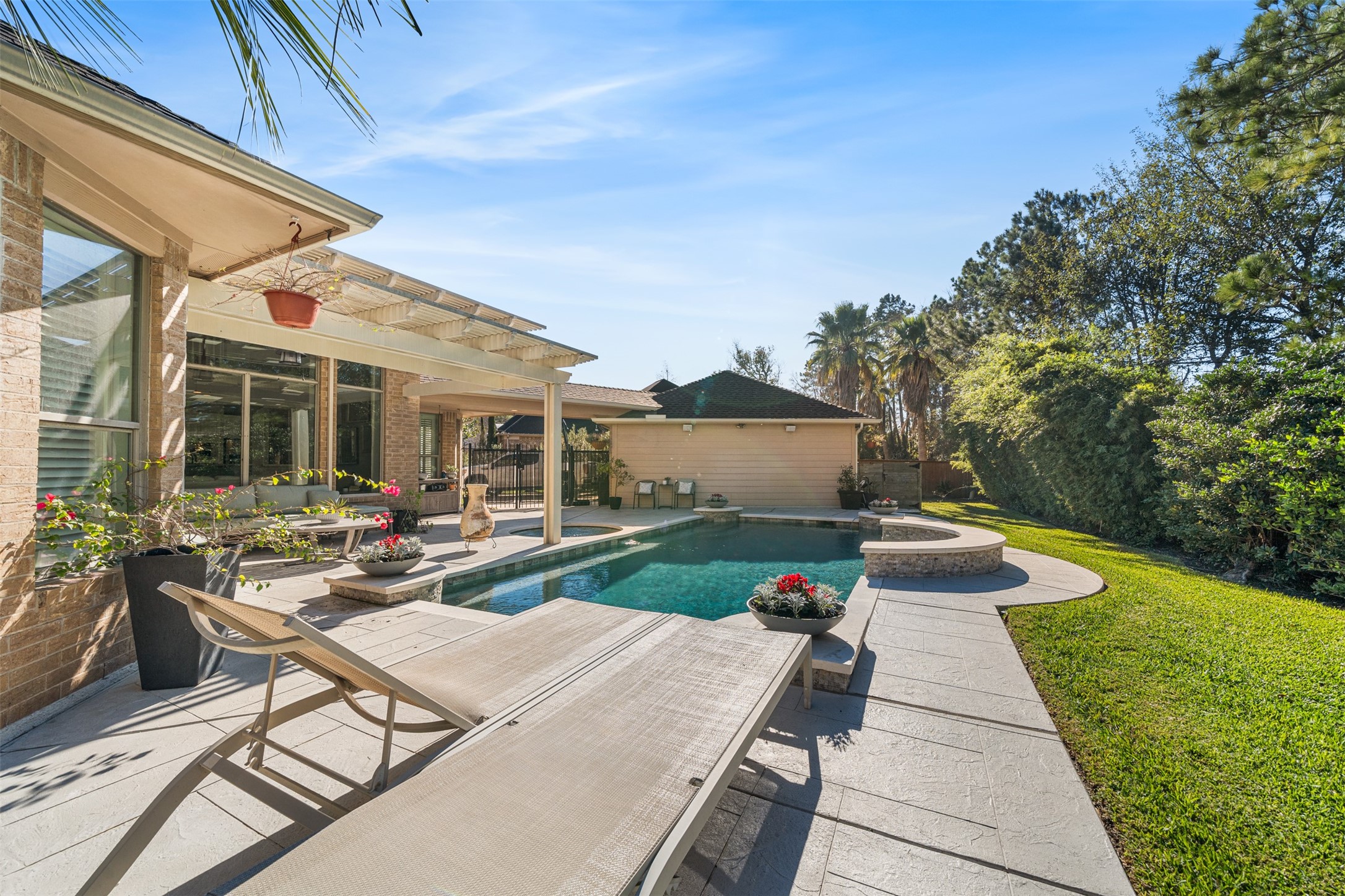 28446 Shining Creek Lane Spring, TX 77386 - Photo 41 of 47 a view of a patio with chairs and plants