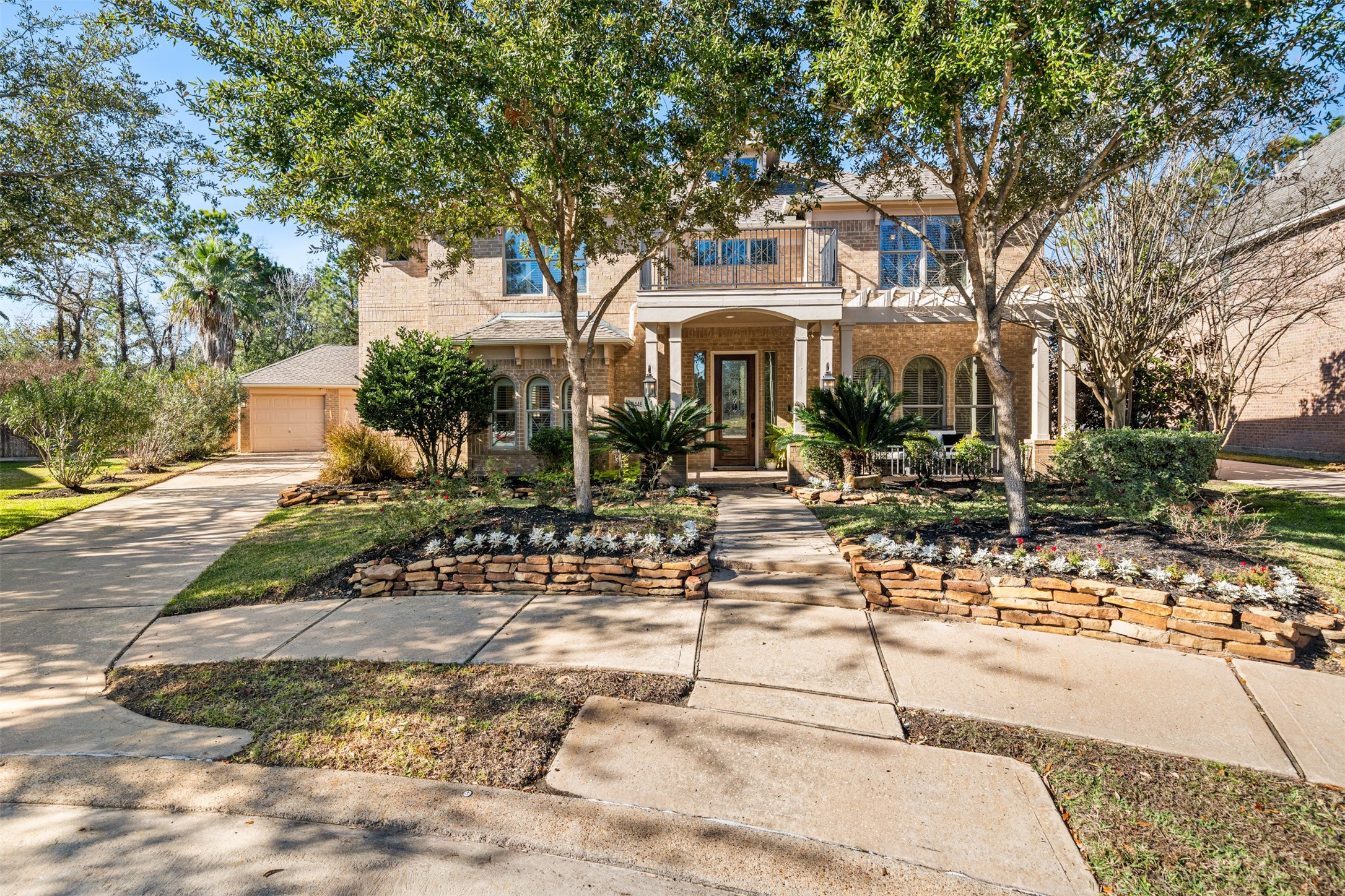 28446 Shining Creek Lane Spring, TX 77386 - Photo 44 of 47 a front view of a building with trees