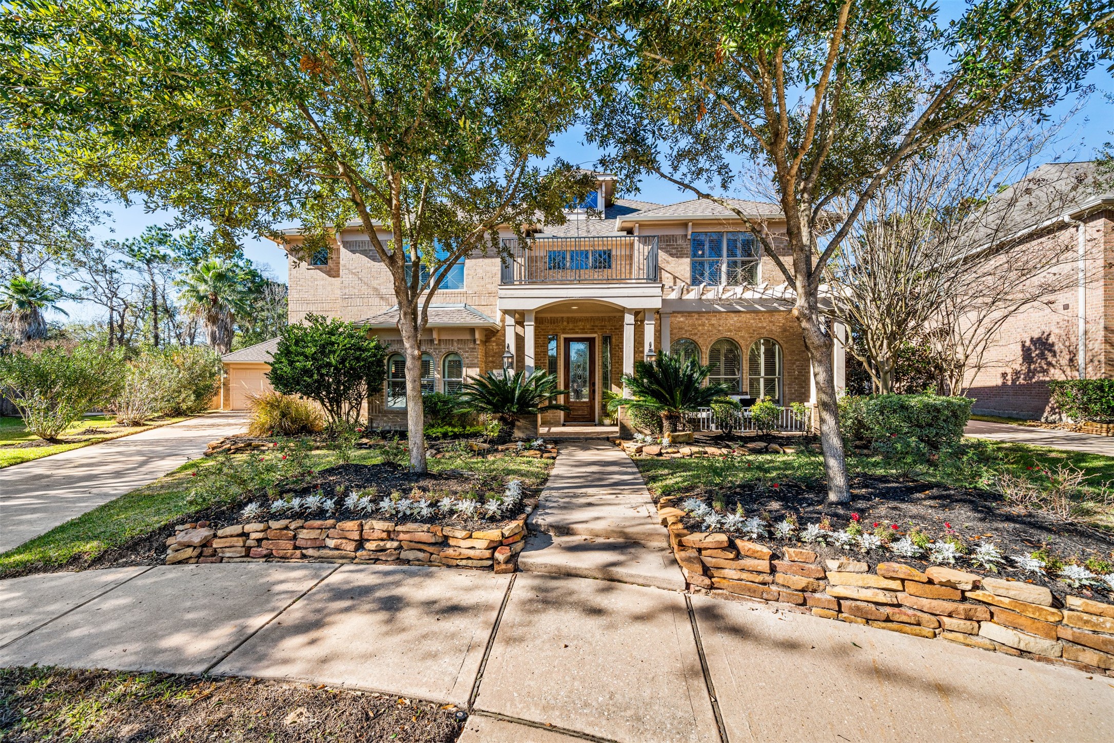28446 Shining Creek Lane Spring, TX 77386 - Photo 45 of 47 a front view of a house with garden