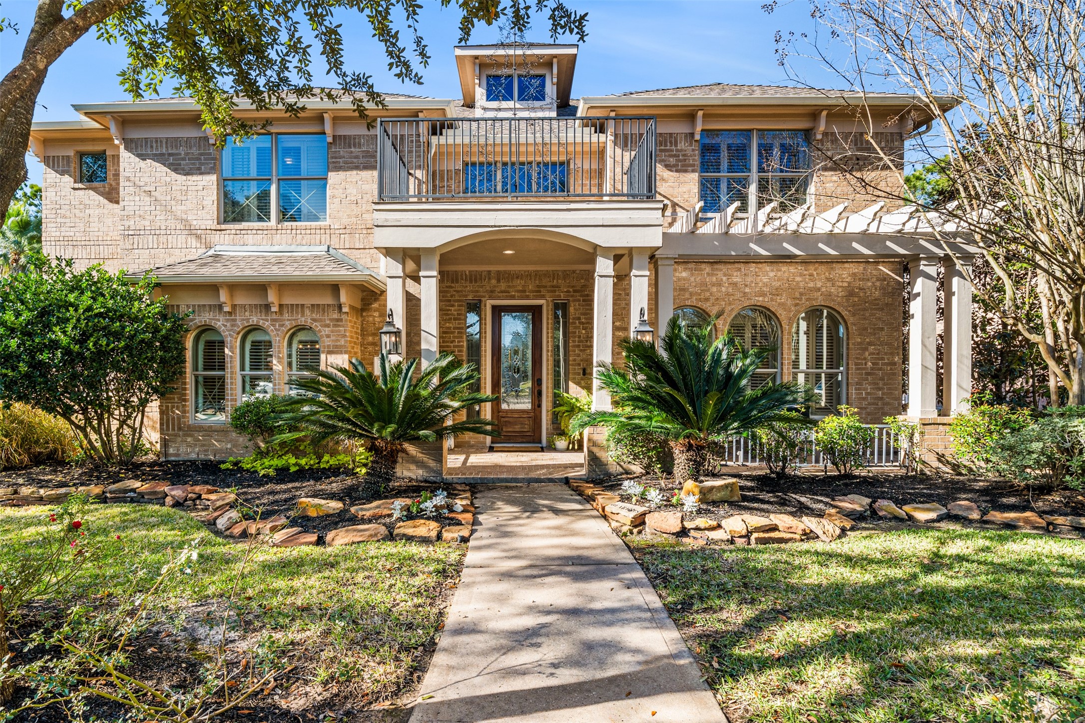 28446 Shining Creek Lane Spring, TX 77386 - Photo 46 of 47 a front view of a house with yard porch and furniture