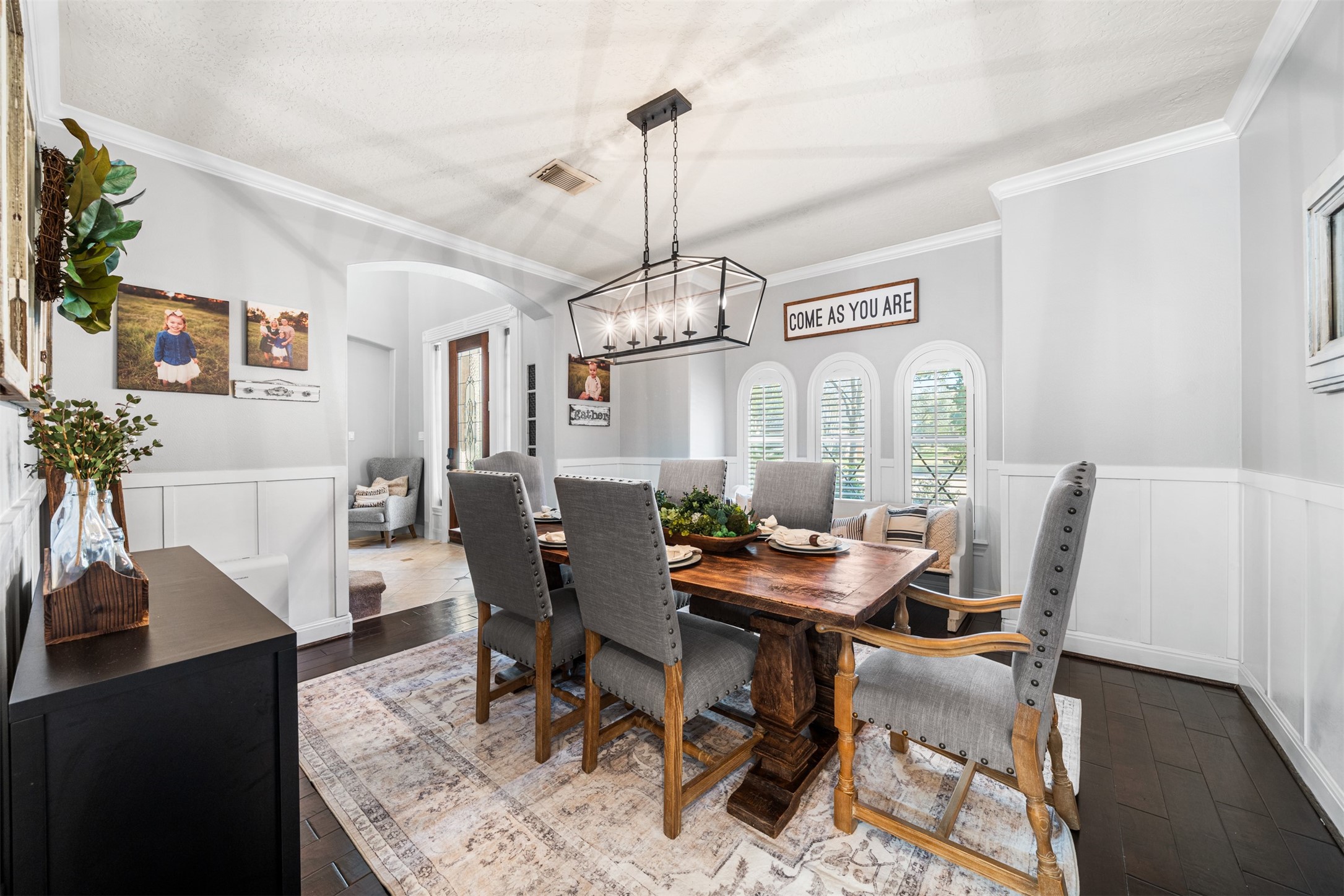 28446 Shining Creek Lane Spring, TX 77386 - Photo 7 of 47 a view of a dining room with furniture window and wooden floor