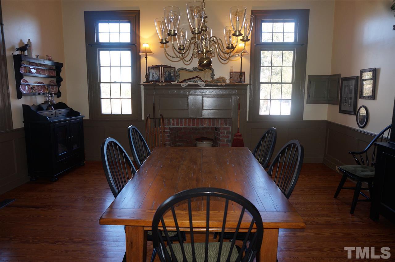 3919 Raleigh Road Clayton, NC 27520 - Photo 14 of 25 Dining room view to fireplace
