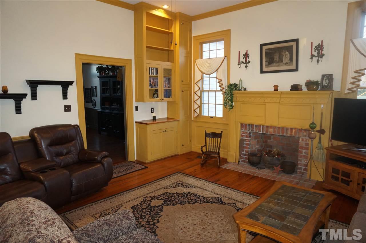 3919 Raleigh Road Clayton, NC 27520 - Photo 7 of 25 Main floor living room with fireplace