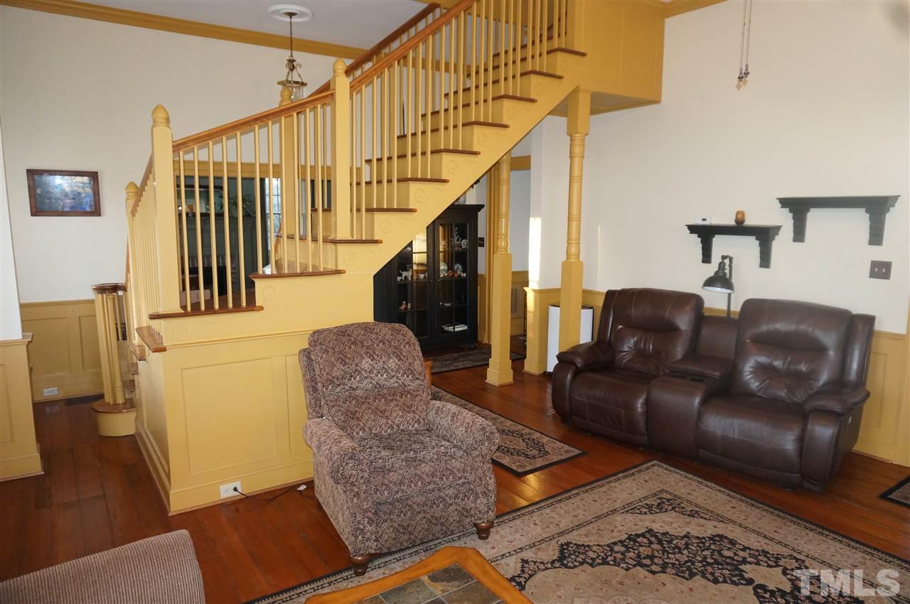 3919 Raleigh Road Clayton, NC 27520 - Photo 10 of 25 Living room stairwell view