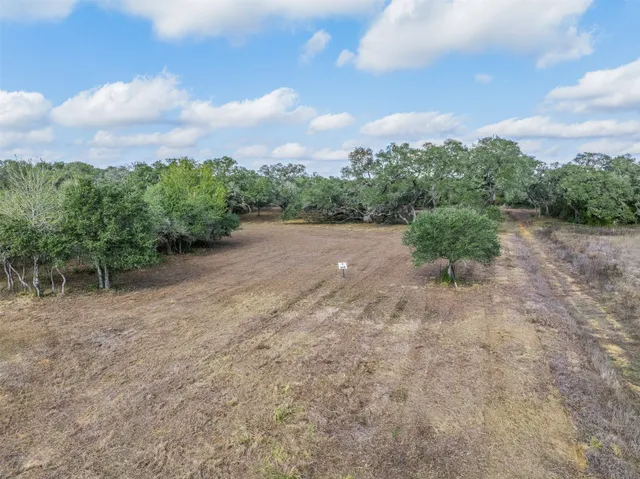 a view of lake with mountain in the background