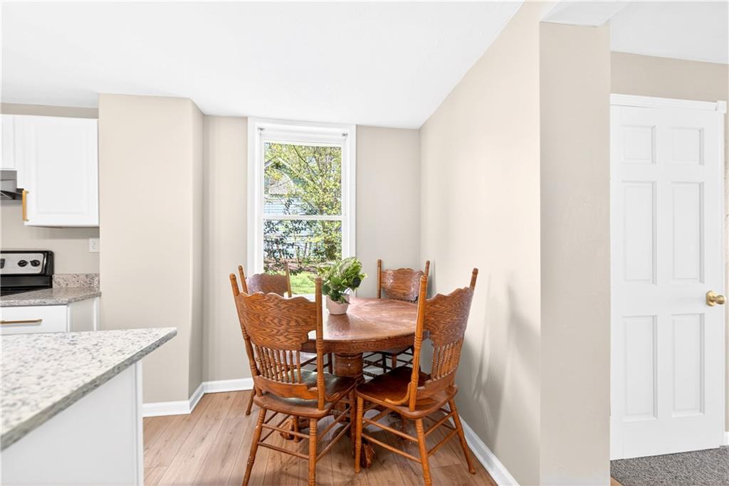 116 Dutchtown Road Herminie, PA 15637 - Photo 21 of 49 a view of a dining room with furniture and wooden floor