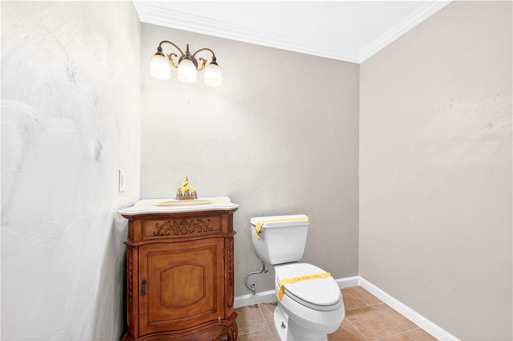 116 Dutchtown Road Herminie, PA 15637 - Photo 24 of 49 a white toilet sitting next to a bathroom sink