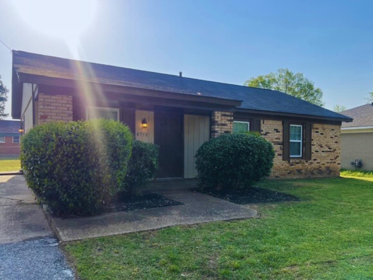 a view of a house with a garden