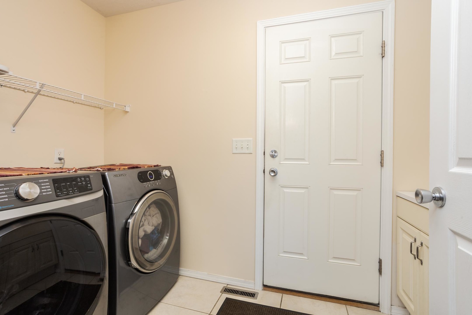 2884 Three Eagles Street Normal, IL 61761 - Photo 22 of 48 a utility room with dryer and washer