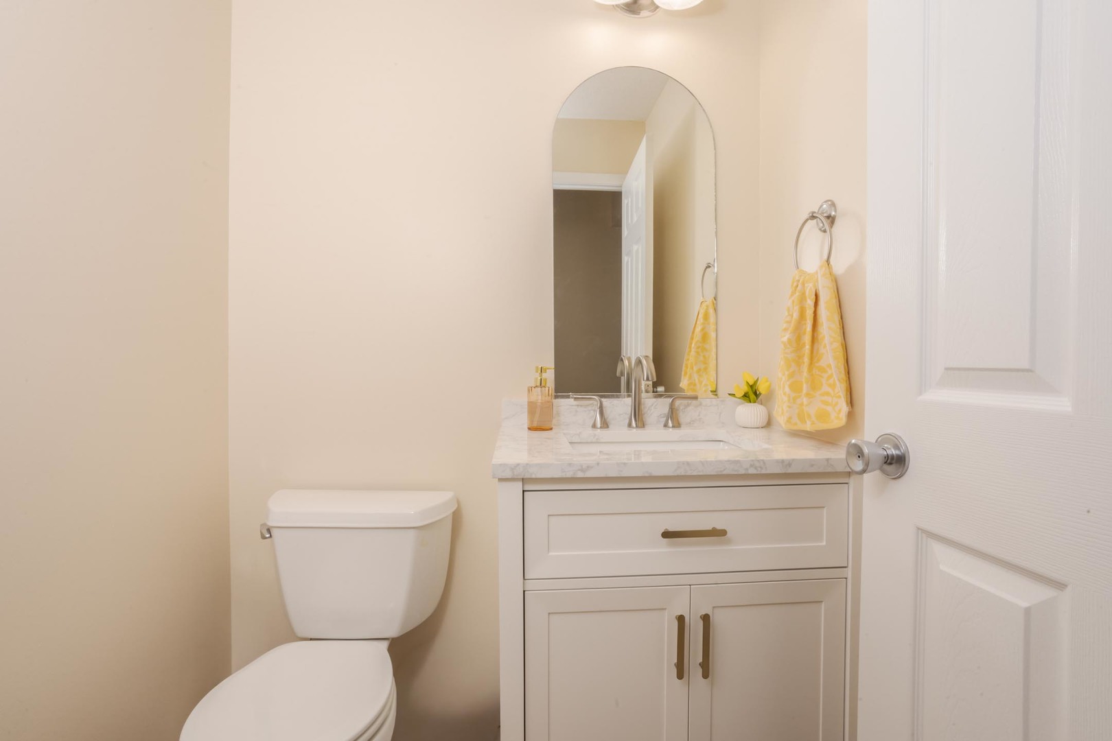 2884 Three Eagles Street Normal, IL 61761 - Photo 23 of 48 a bathroom with a toilet sink and mirror