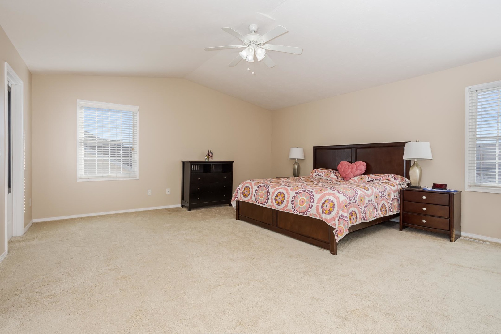 2884 Three Eagles Street Normal, IL 61761 - Photo 24 of 48 a bedroom with a bed and a ceiling fan