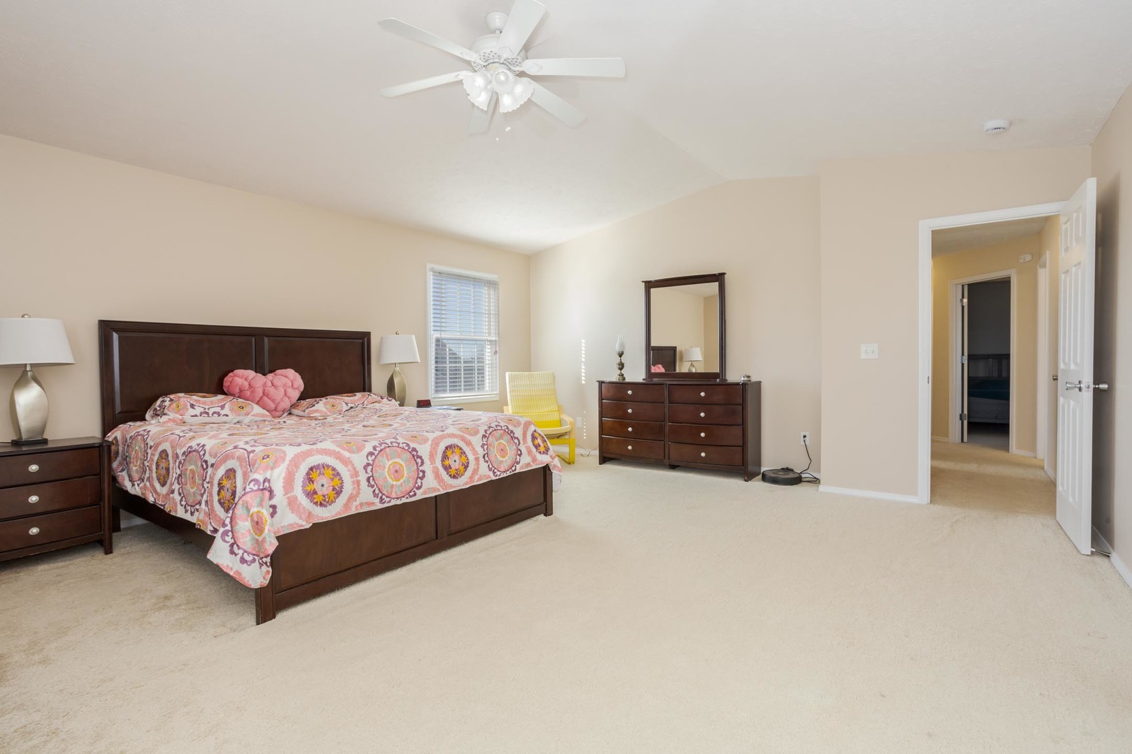 2884 Three Eagles Street Normal, IL 61761 - Photo 25 of 48 a bedroom with a bed and a chandelier