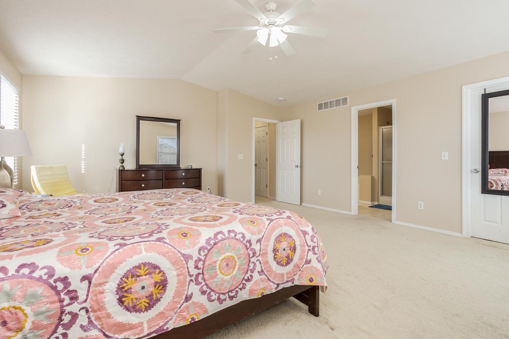 2884 Three Eagles Street Normal, IL 61761 - Photo 26 of 48 a bedroom with a bed and a chandelier
