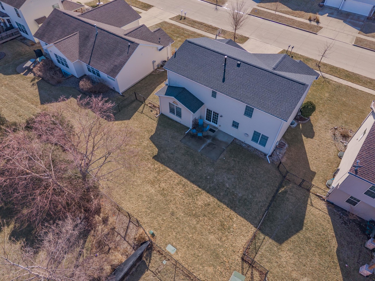 2884 Three Eagles Street Normal, IL 61761 - Photo 3 of 48 a view of a house with a backyard