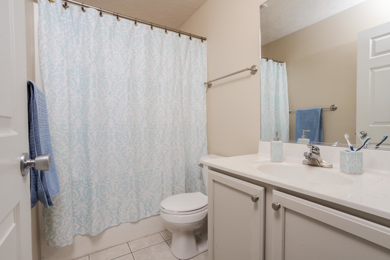 2884 Three Eagles Street Normal, IL 61761 - Photo 31 of 48 a bathroom with a sink a toilet and shower