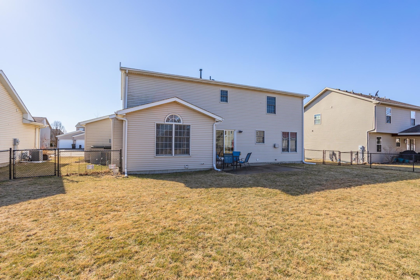 2884 Three Eagles Street Normal, IL 61761 - Photo 41 of 48 a view of a house with backyard and sitting area
