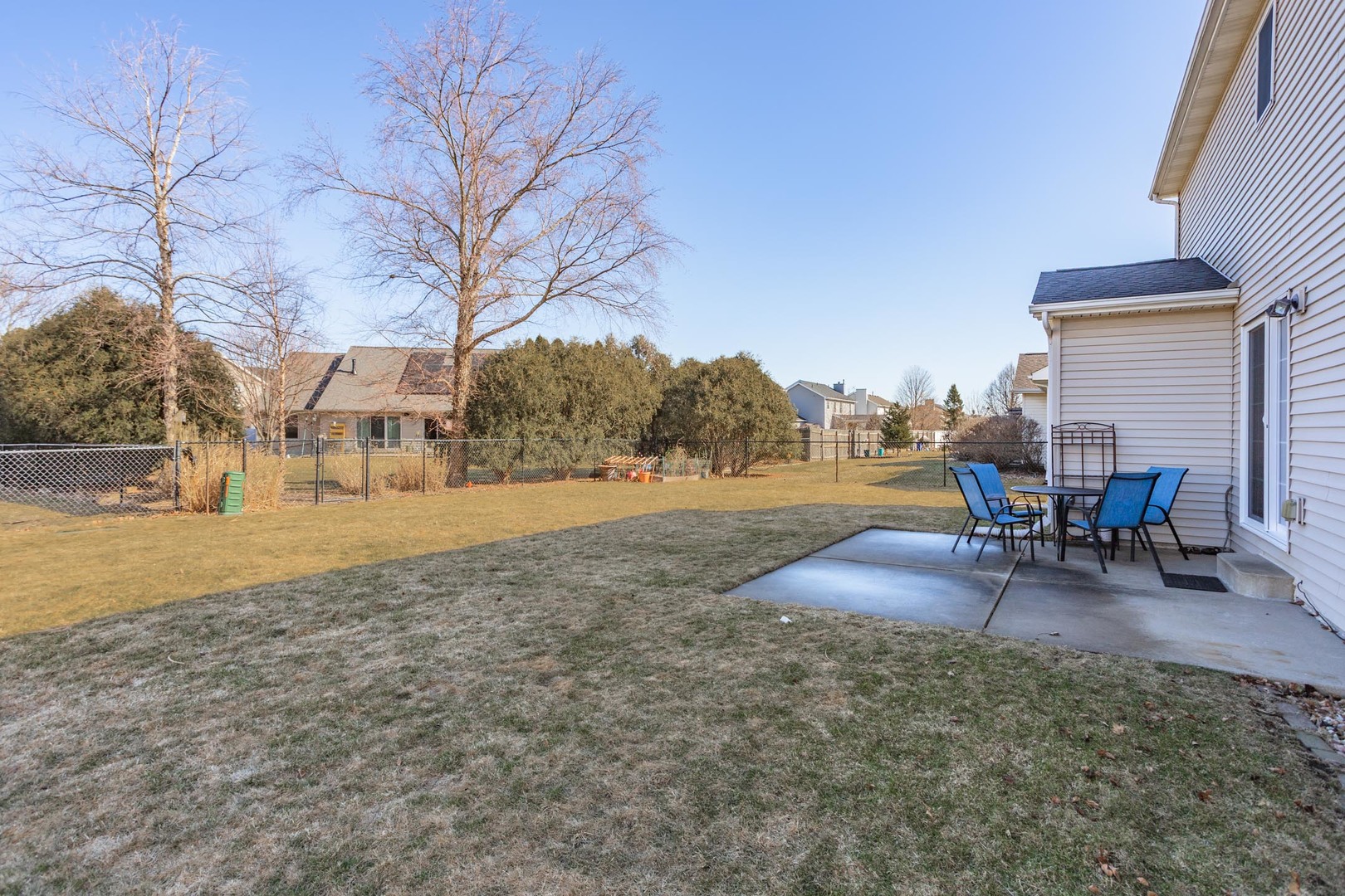 2884 Three Eagles Street Normal, IL 61761 - Photo 44 of 48 a view of a yard with table and chairs