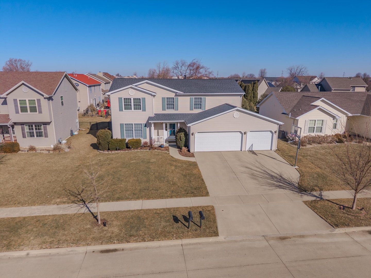 2884 Three Eagles Street Normal, IL 61761 - Photo 45 of 48 a front view of a house with a garden