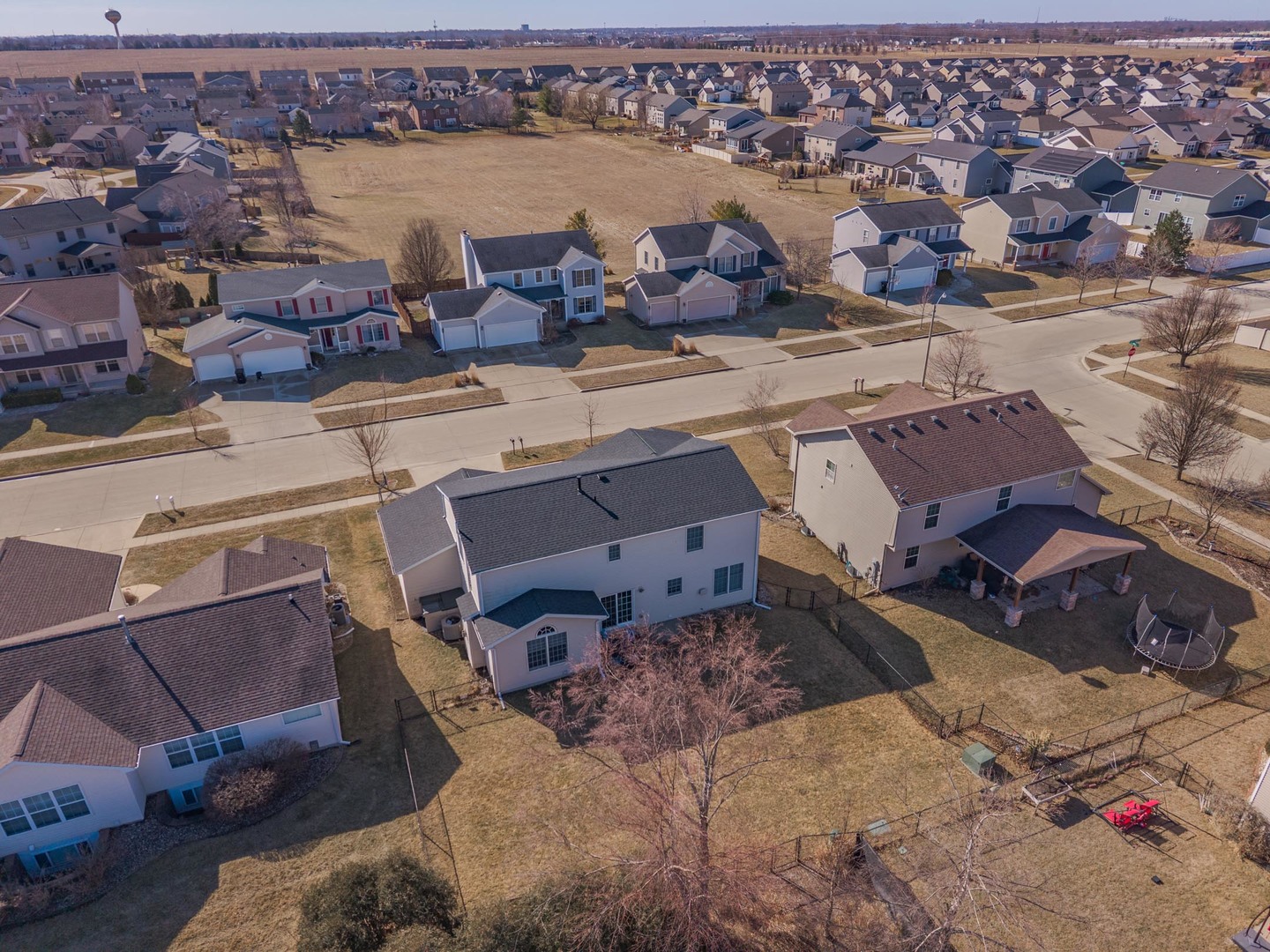 2884 Three Eagles Street Normal, IL 61761 - Photo 47 of 48 an aerial view of a house with a lake view