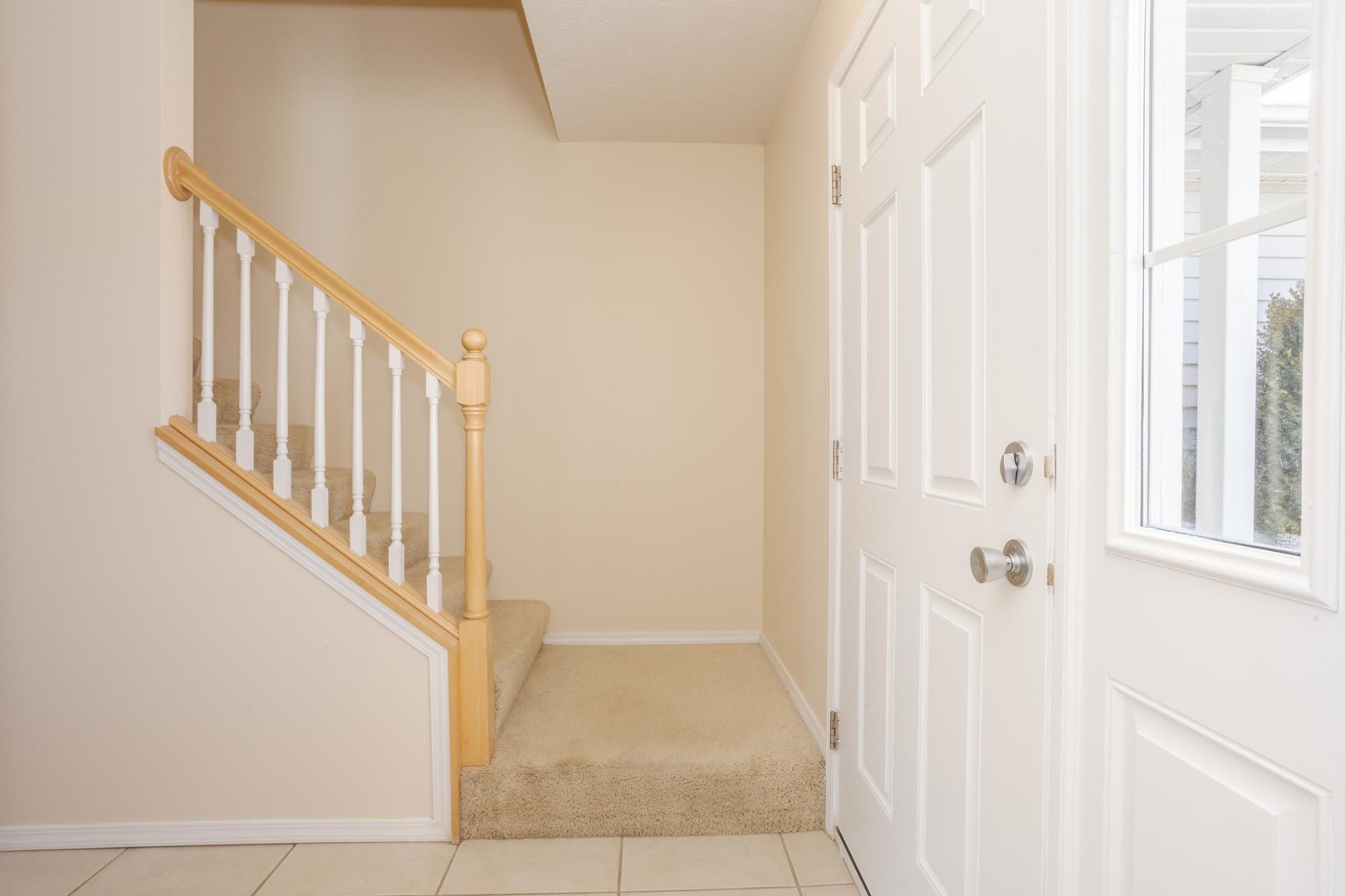 2884 Three Eagles Street Normal, IL 61761 - Photo 5 of 48 a view of a hallway with a white door