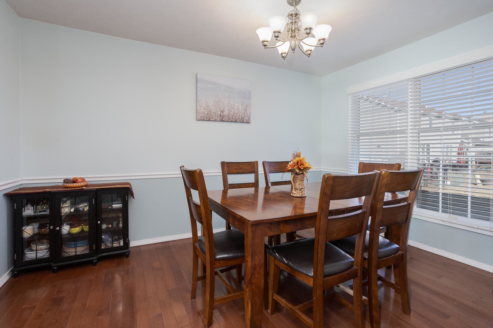 2884 Three Eagles Street Normal, IL 61761 - Photo 9 of 48 a view of a dining room with furniture and wooden floor