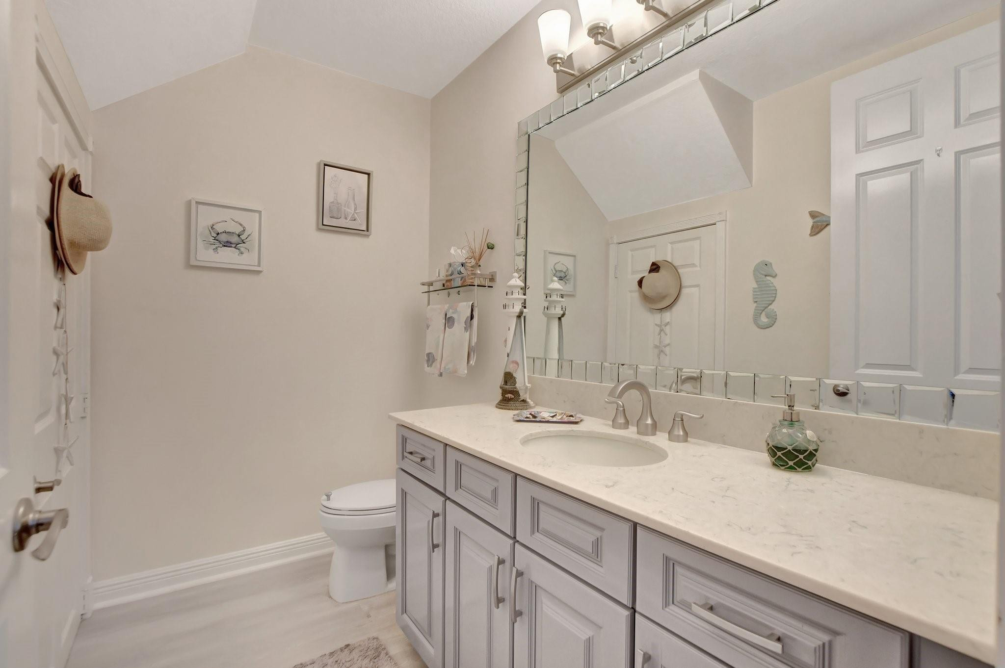 8316 Northwest 9th Avenue Boca Raton, FL 33487 - Photo 10 of 51 Half bath on first floor