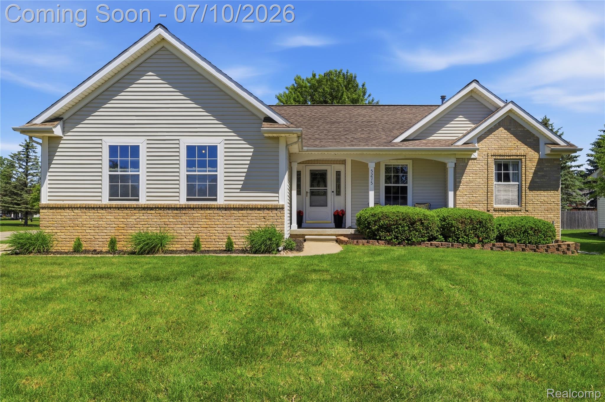 5275 East Maple Avenue Grand Blanc, MI 48439 - Photo 2 of 53 Single-story residence featuring light-toned siding and brick accents