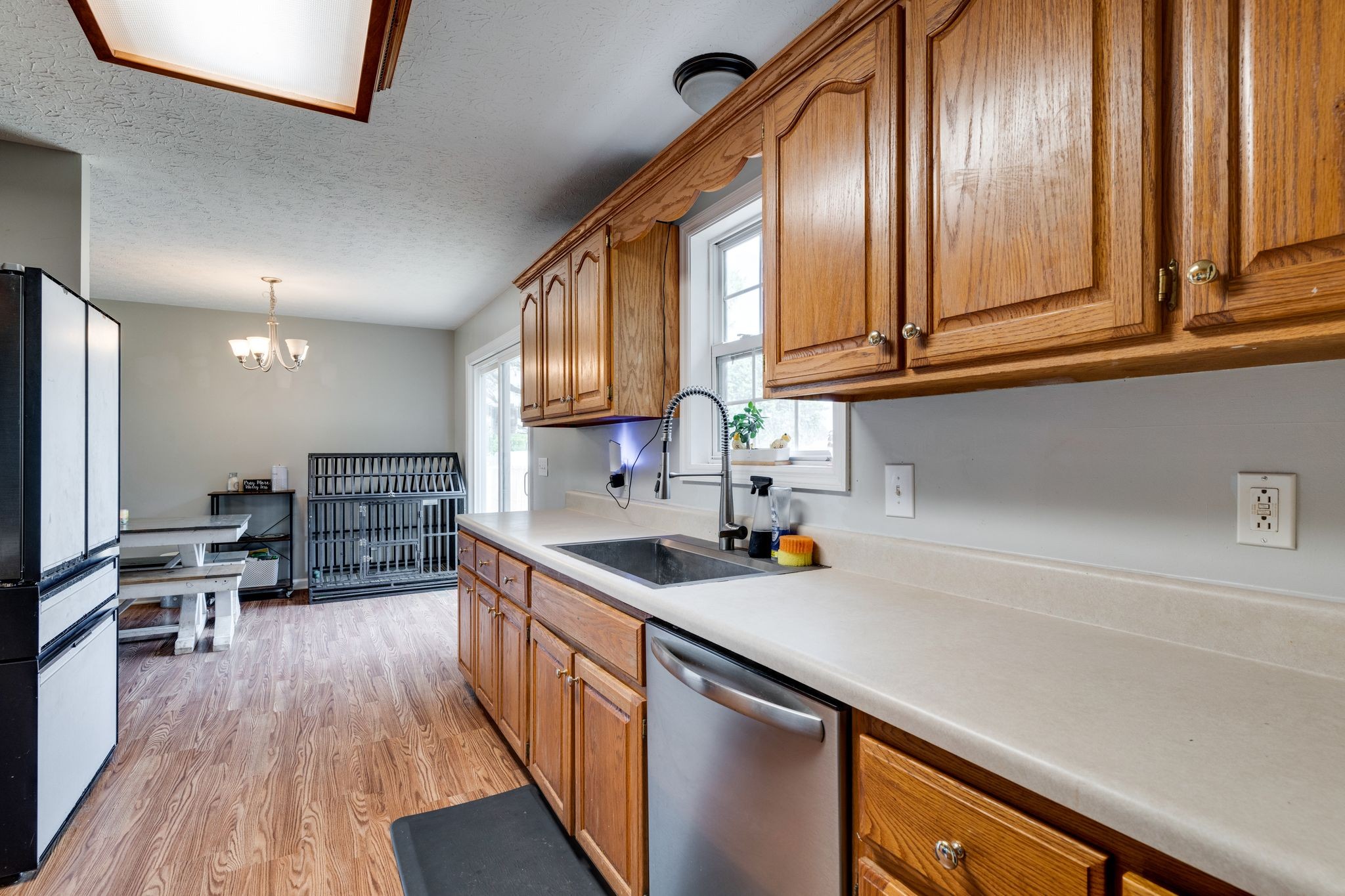 630 Portland Boulevard Portland, TN 37148 - Photo 13 of 29 a kitchen with stainless steel appliances granite countertop a sink a stove and cabinets